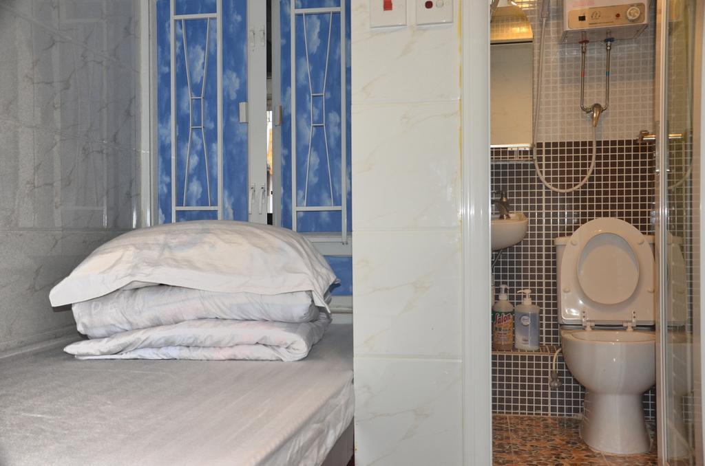 Tai Hao Hostel Хонконг Стая снимка