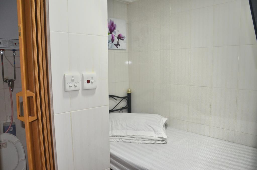 Tai Hao Hostel Хонконг Стая снимка