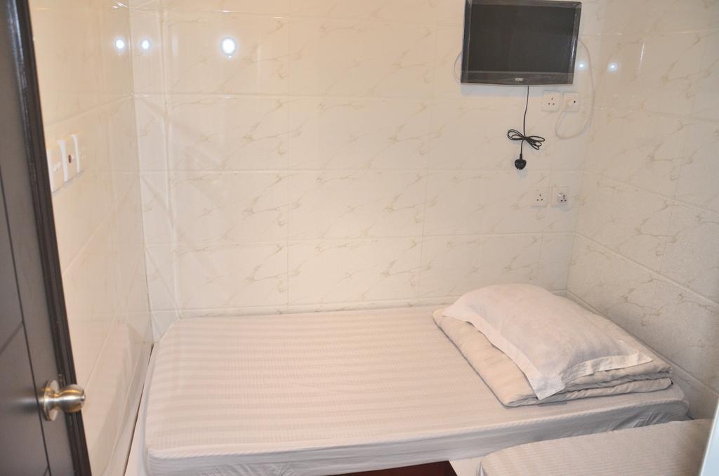Tai Hao Hostel Хонконг Стая снимка
