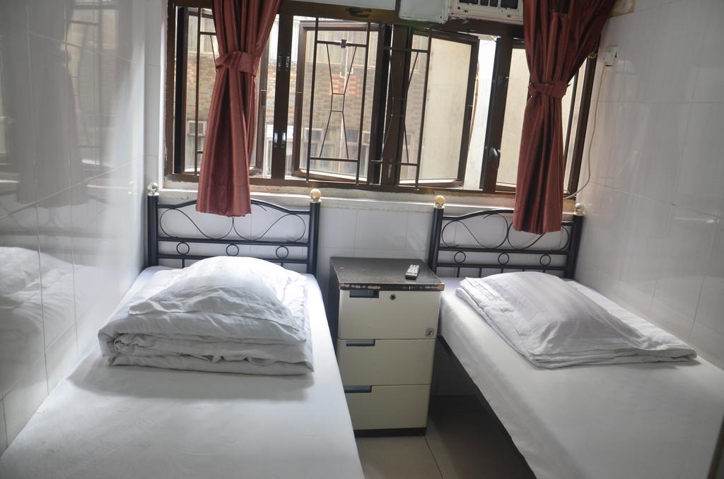 Tai Hao Hostel Хонконг Стая снимка